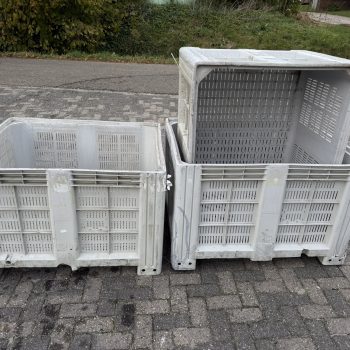 Geperforeerde kunststof palletbox met lichte schade